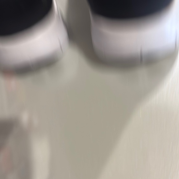 Nike Black and White Sneakers with Knit Upper and Sleek Design - Picture 3 of 5